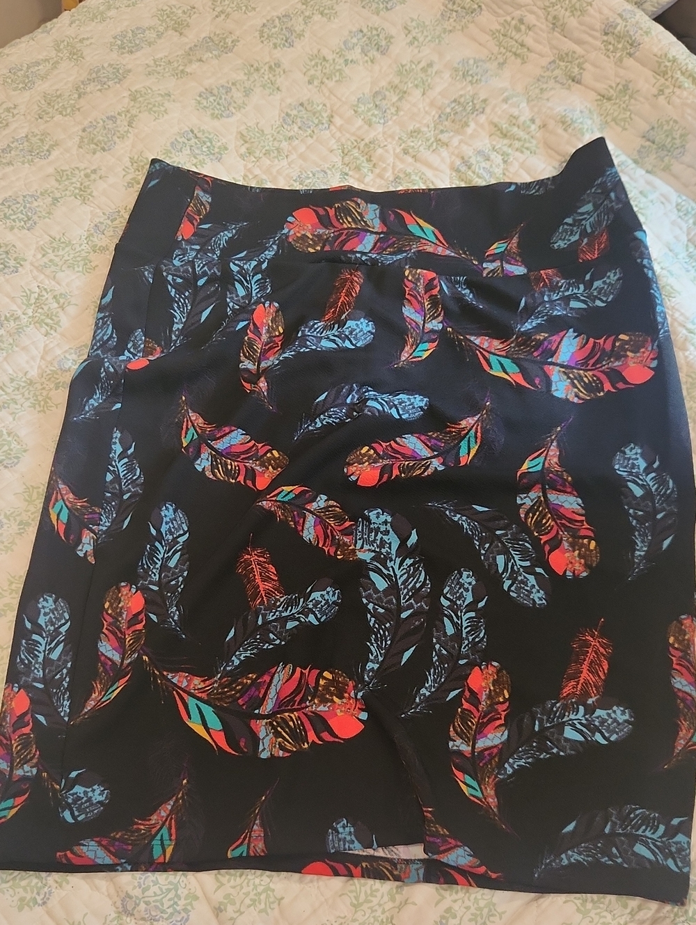 LuLaRoe Black Skirt with Teal, Red, Orange & Purple Feather Motif